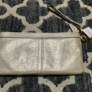 Metallic coach handbag